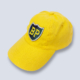 Yellow vintage cap with green and yellow BP shield patch on front.