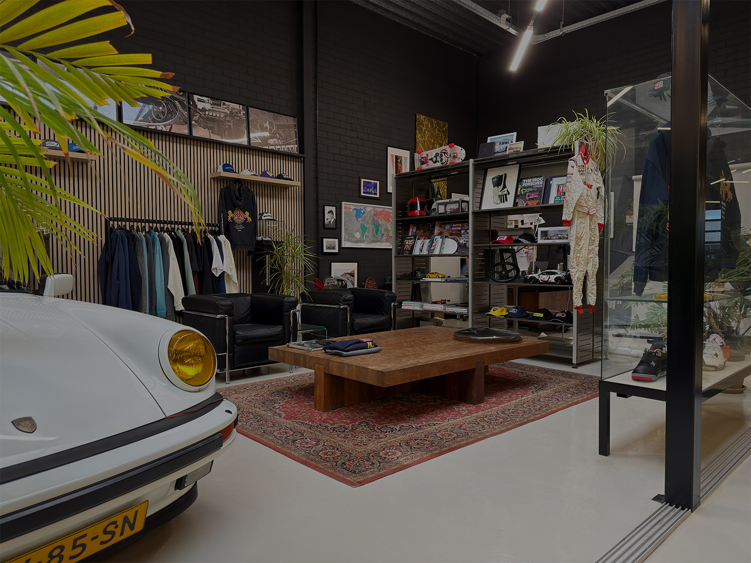 Showroom with Porsche and clothing Racing Relics